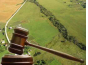 Суд привлек к ответственности собственника земельных участков сельскохозяйственного назначения в Тульской области, не оплатившего штраф в установленный срок